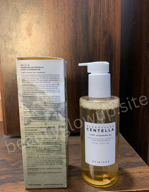 Skincare bottle with pump and packaging on a wooden surface