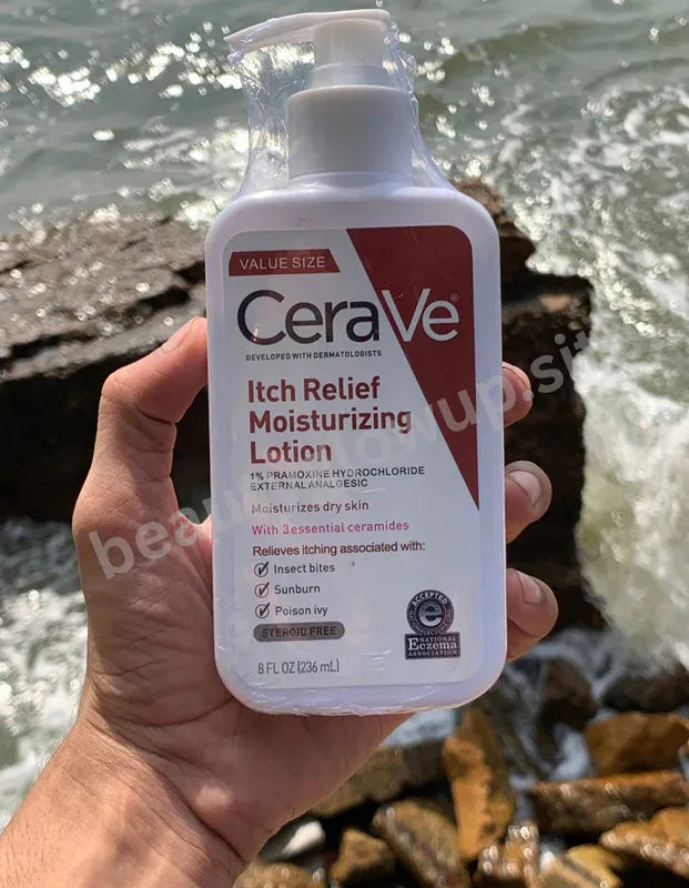 CeraVe Itch Relief Moisturizing Lotion held in a hand with a natural background