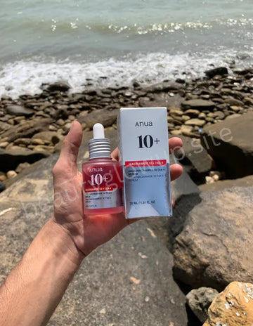 ANUA Niacinamide 10 percent TXA 4 percent Dark Spot Correcting Serum 30ml seaside background