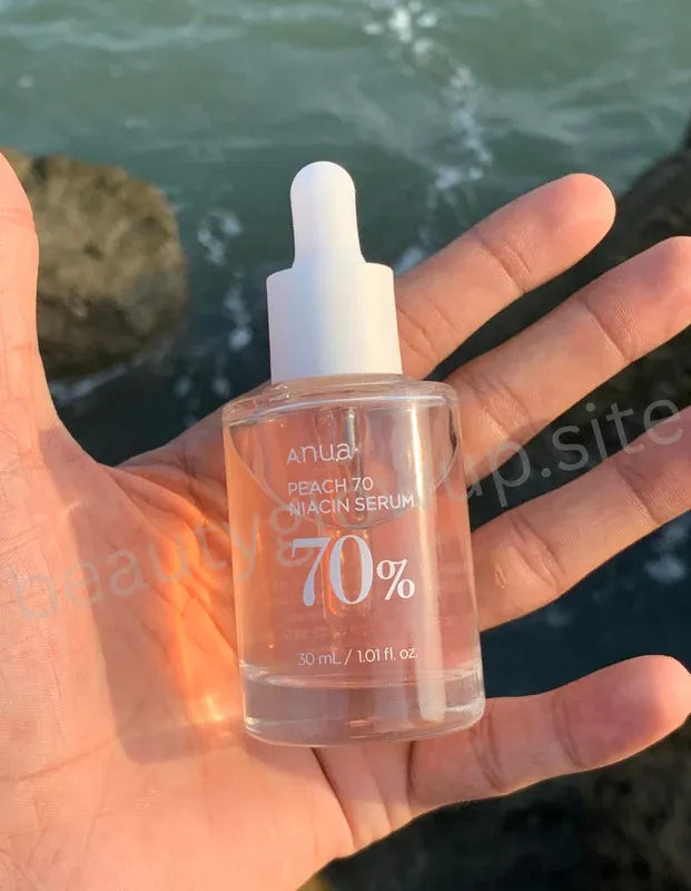 ANUA Peach Niacin hydrating serum 30ml seaside background